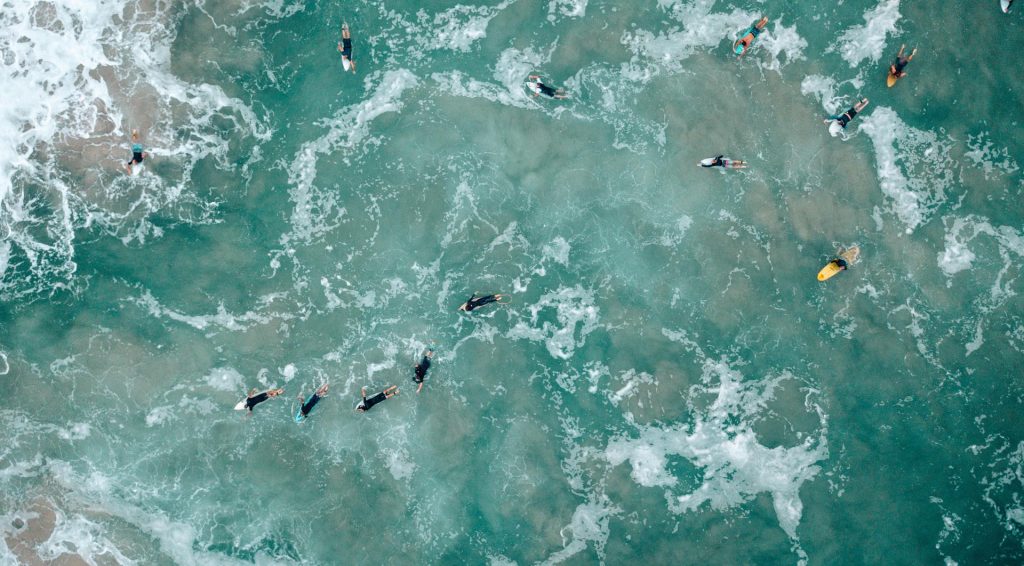 Aerial photo of surfers in the ocean